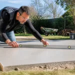 Comment réaliser la dalle béton de votre abri de jardin ?